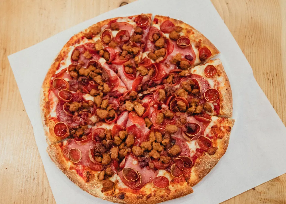 RedHawk pizza: Canadian bacon, Italian sausage, salami, pepperoni, bacon & mozzarella